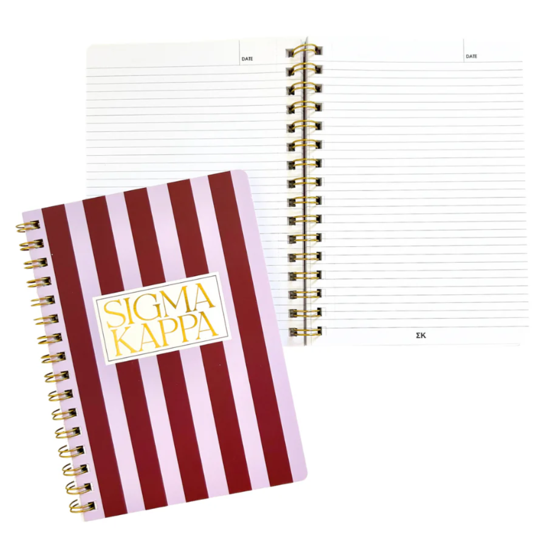 Notebook with red and white striped cover and 'Sigma Kappa' logo on a white background