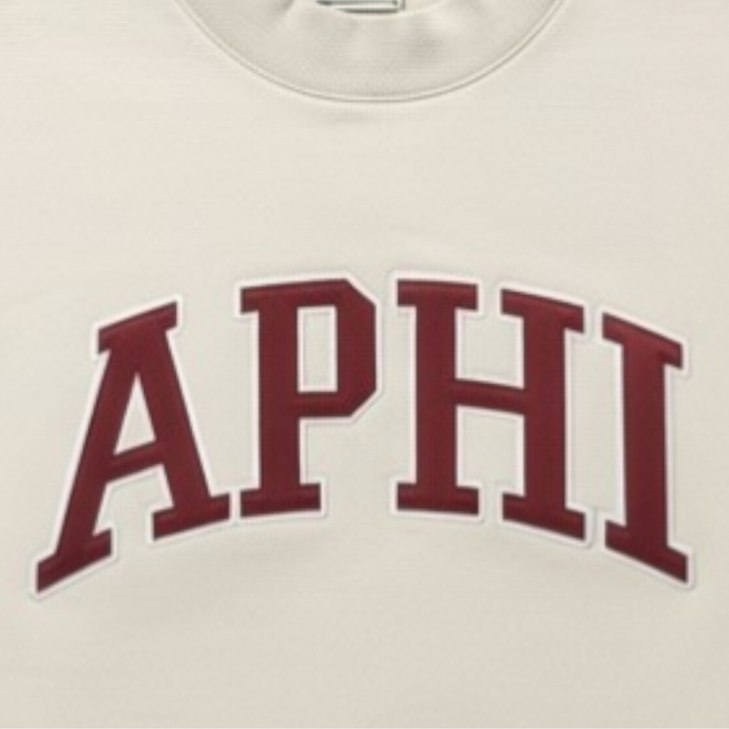 White sweatshirt with 'APHI' printed in maroon on a white background