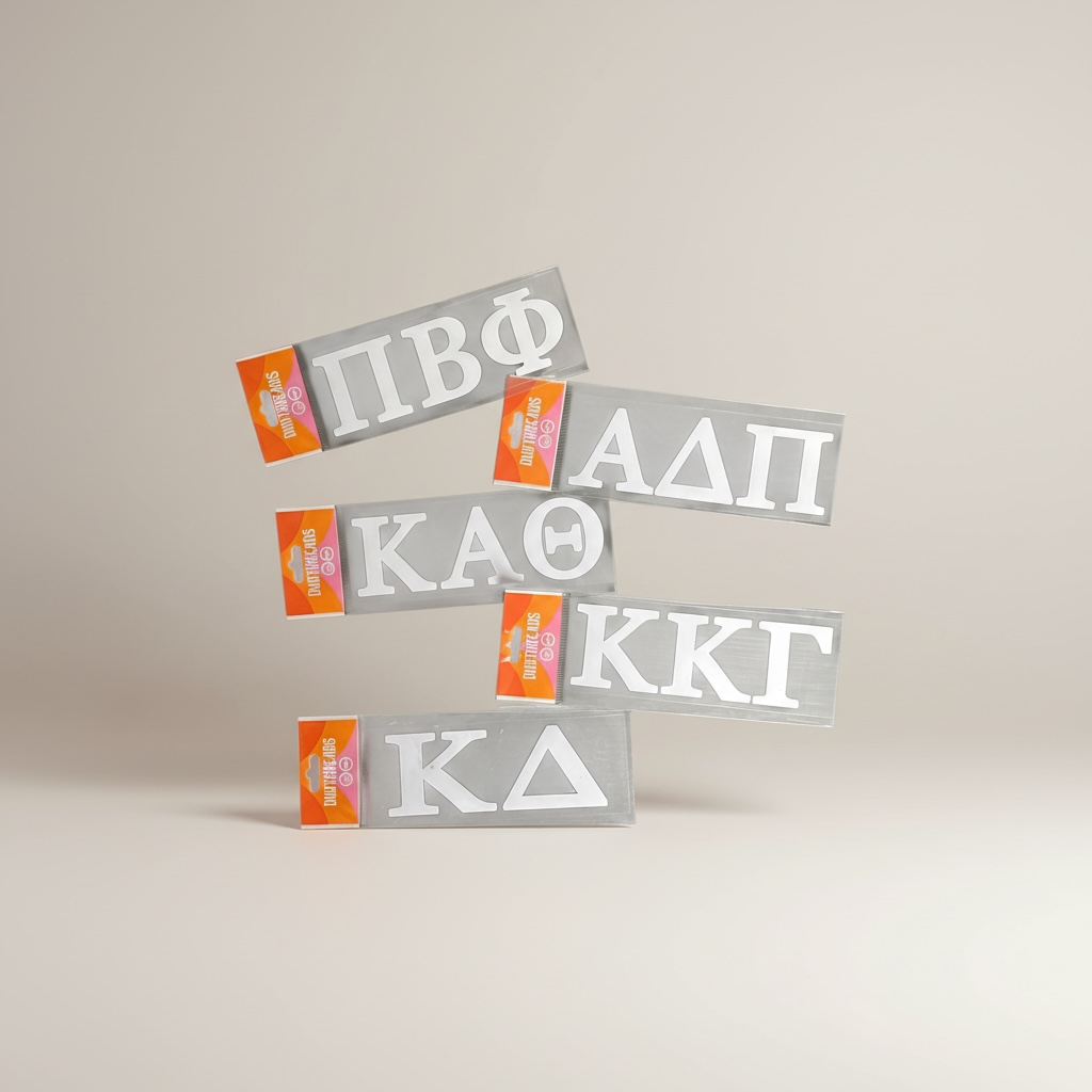 Set of Greek letter stickers on a beige background