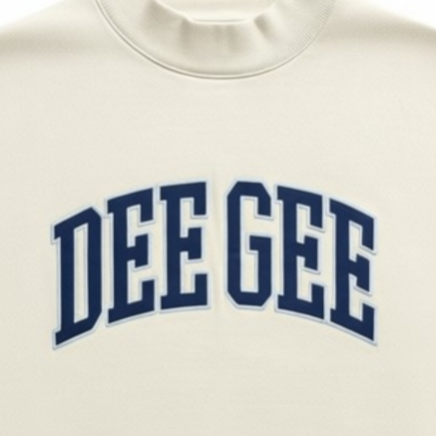 White sweatshirt with 'DEE GEE' printed in blue on a white background