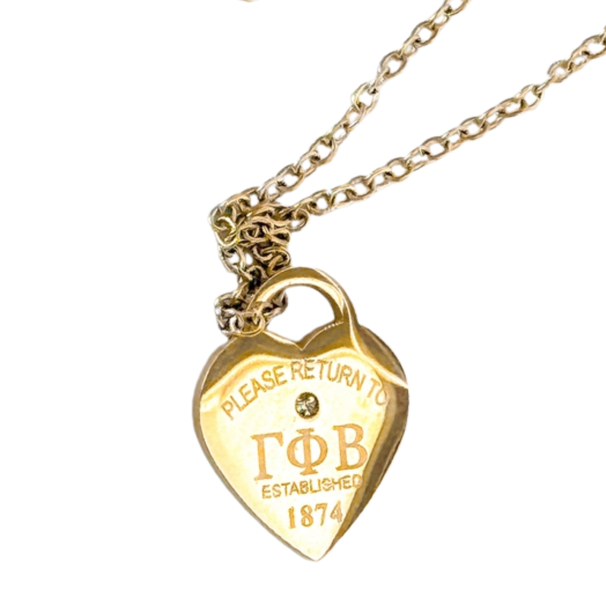Gold heart-shaped pendant with 'Please Return to Gamma Phi Beta' text on a white background