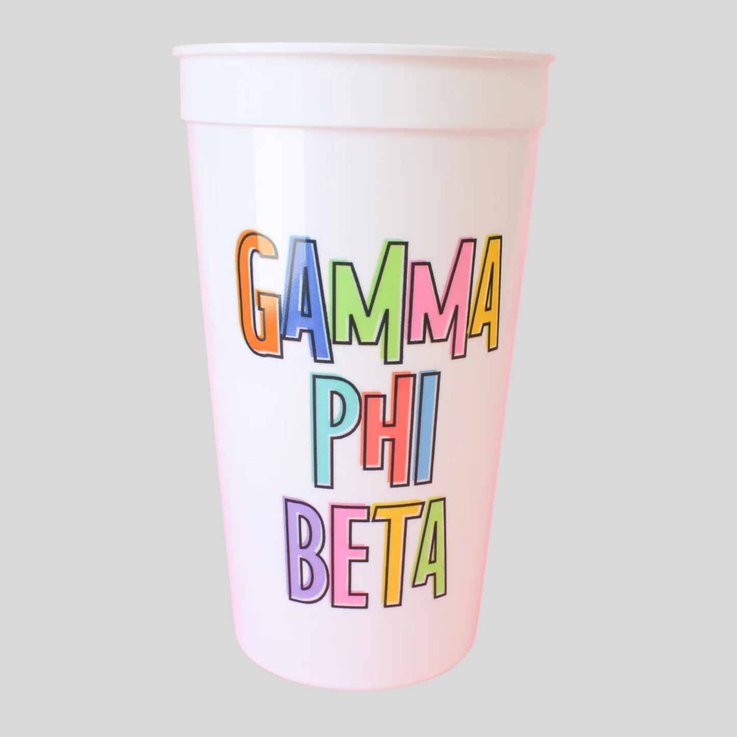 Colorful 'Gamma Phi Beta' text on a white cup against a light gray background
