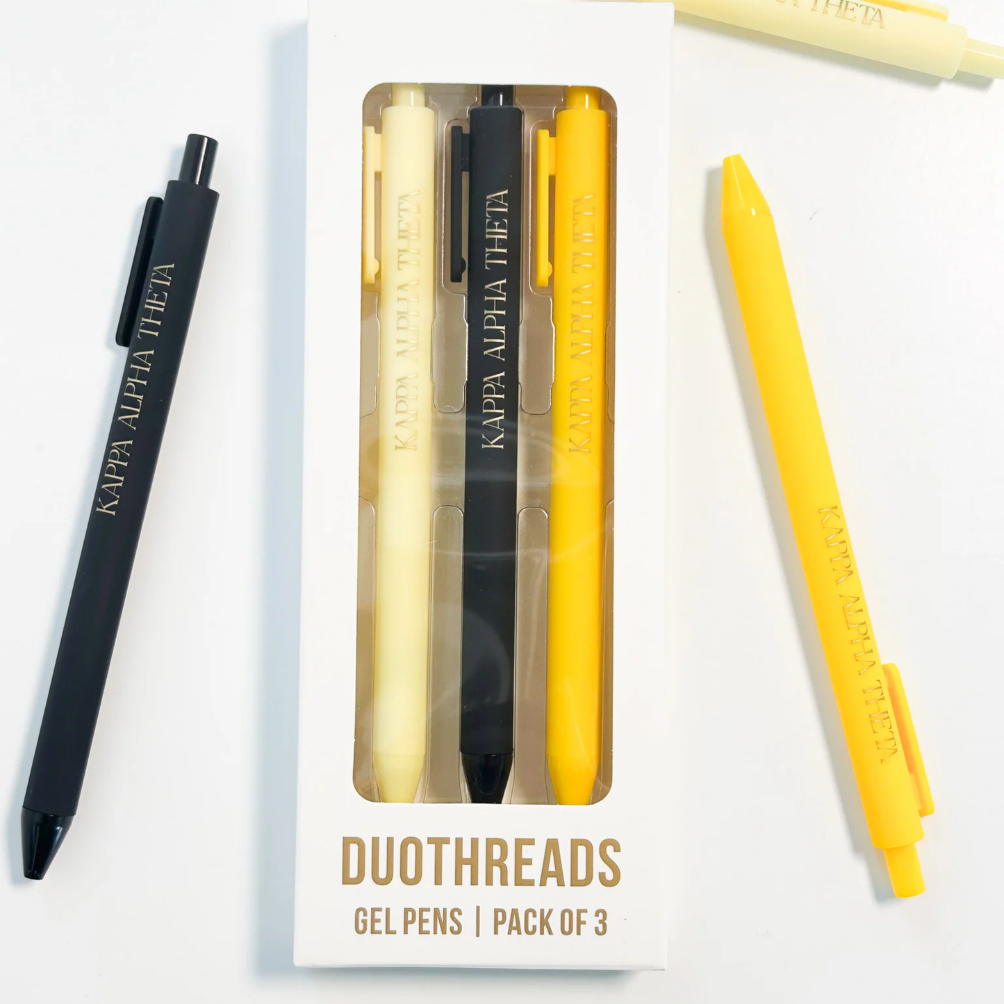 Pack of three gel pens with black and yellow colors, branded 'Kappa Alpha Theta', on a white background.