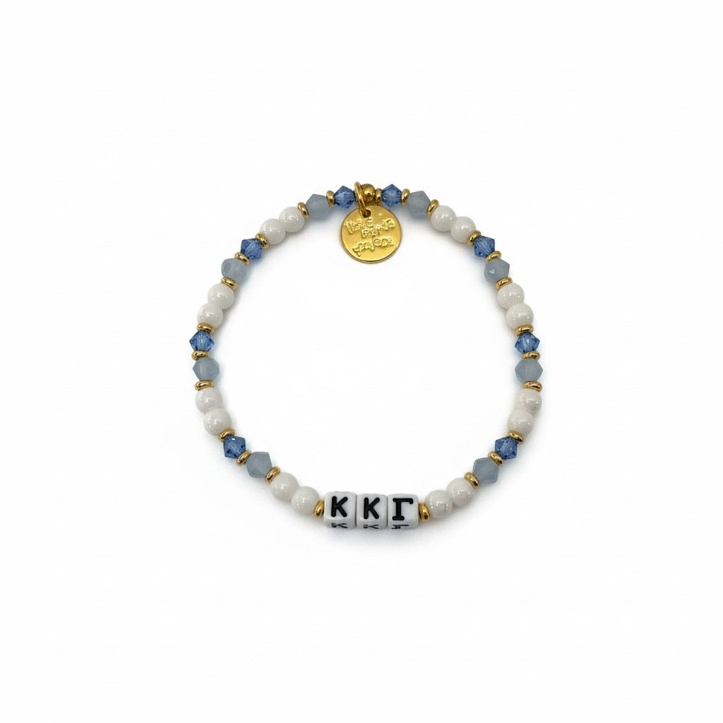 Beaded bracelet with 'KKK' charm on a white background