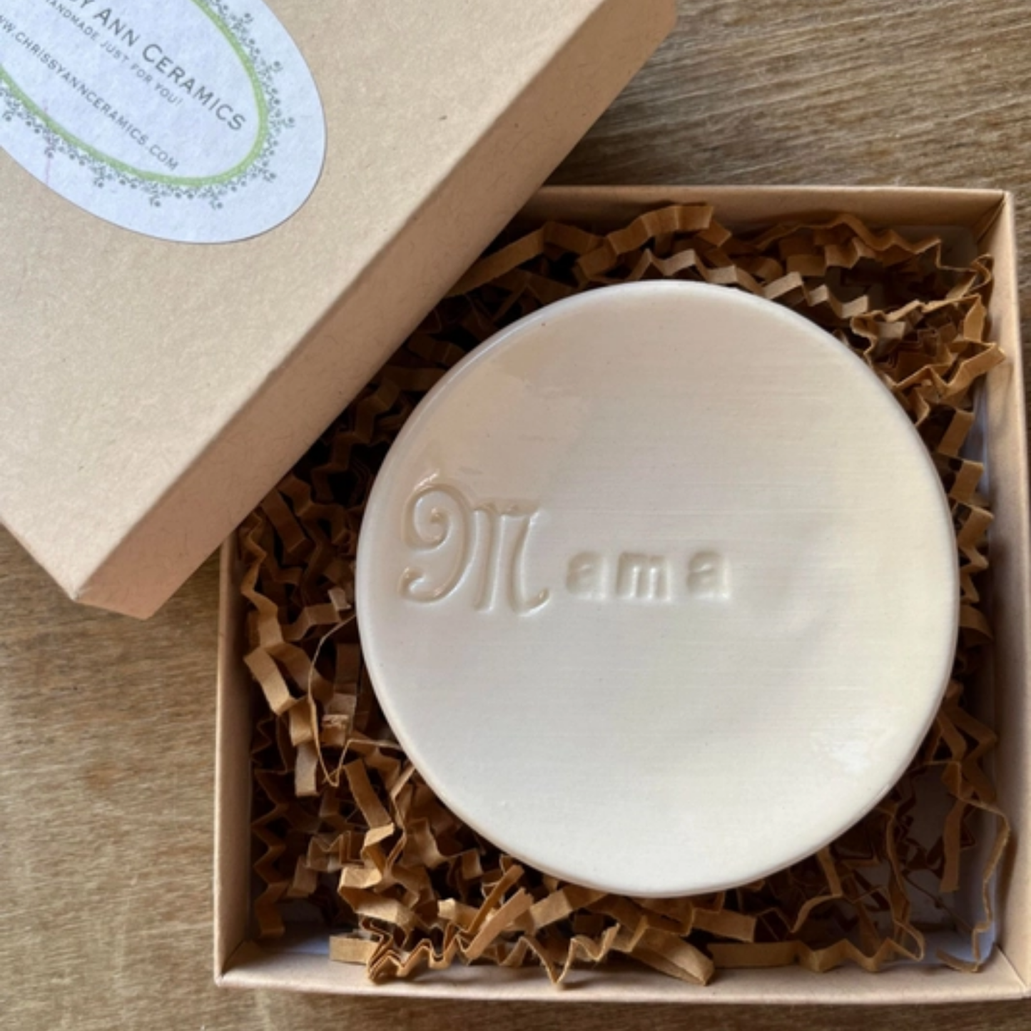 White ceramic dish with 'Mama' engraving in a box, featuring Chrissy Ann Ceramics branding.