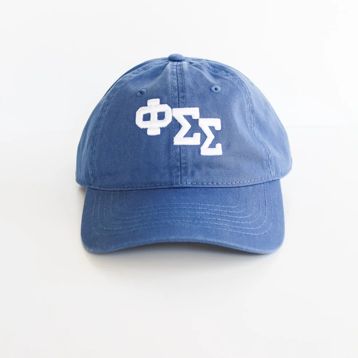 Blue cap with white Greek letters on a white background