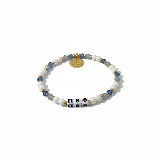 Bracelet with beads and letter beads on a white background