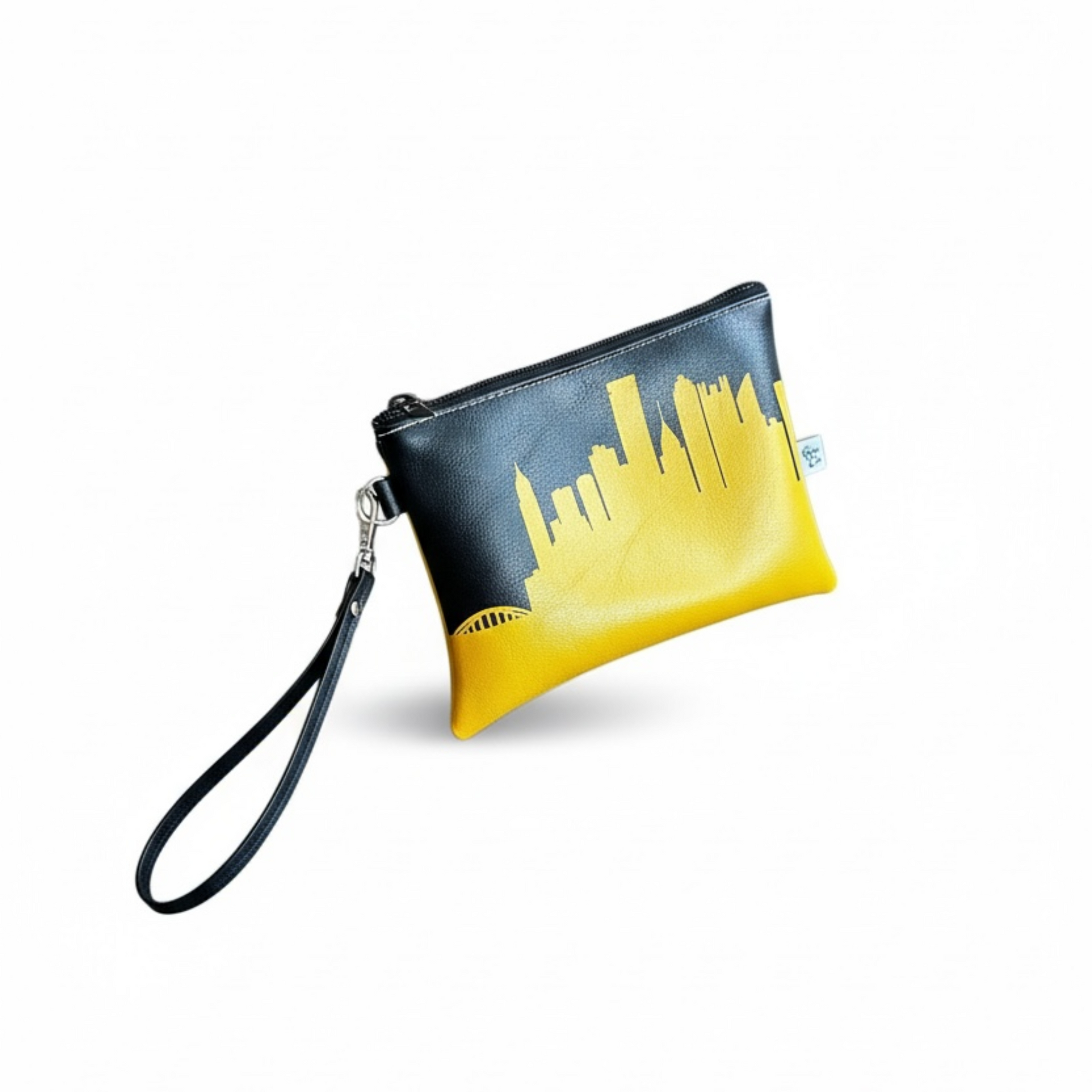 Black wristlet clutch with yellow city skyline design on a white background