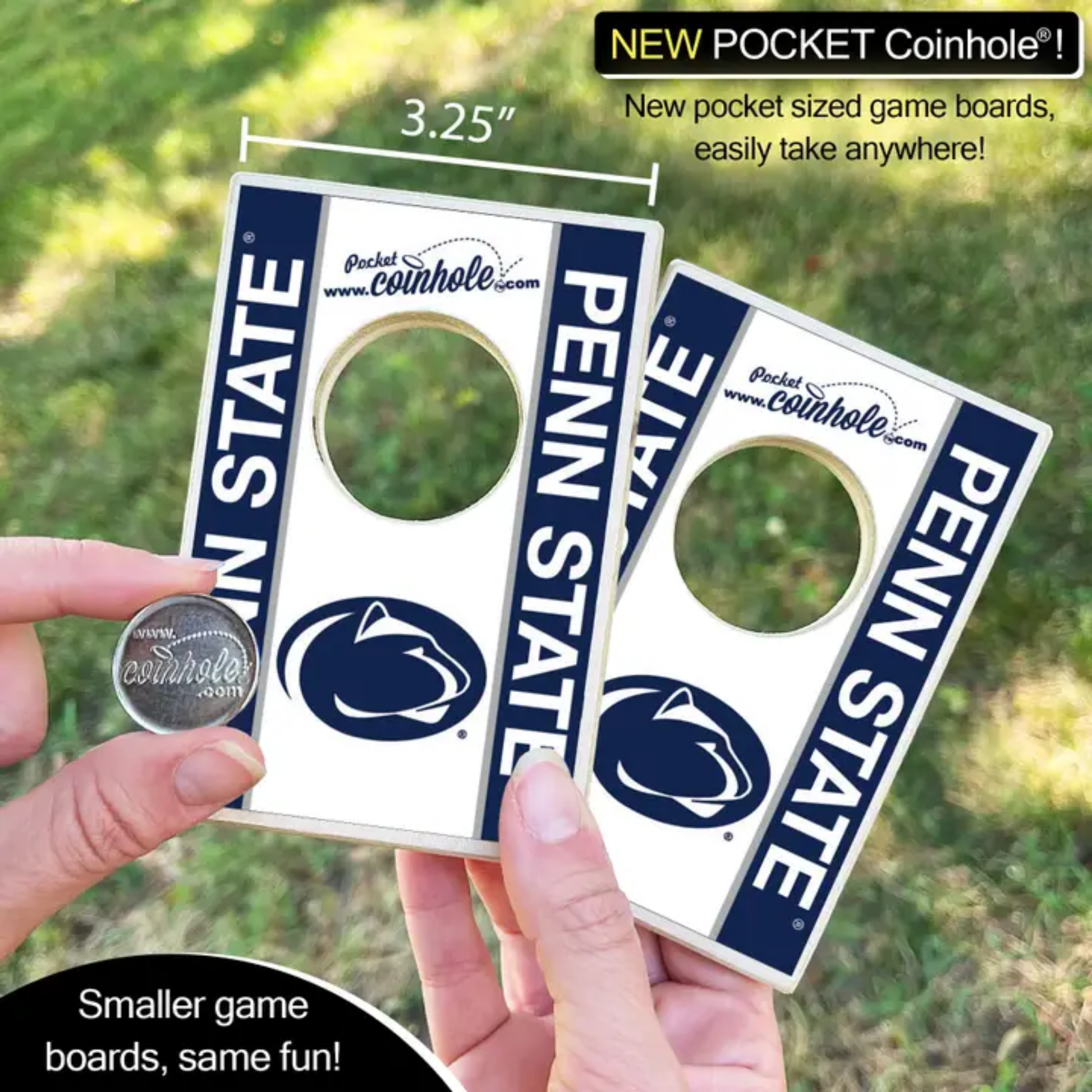 Two Penn State-themed pocket-sized game boards held by a hand with grass in the background.