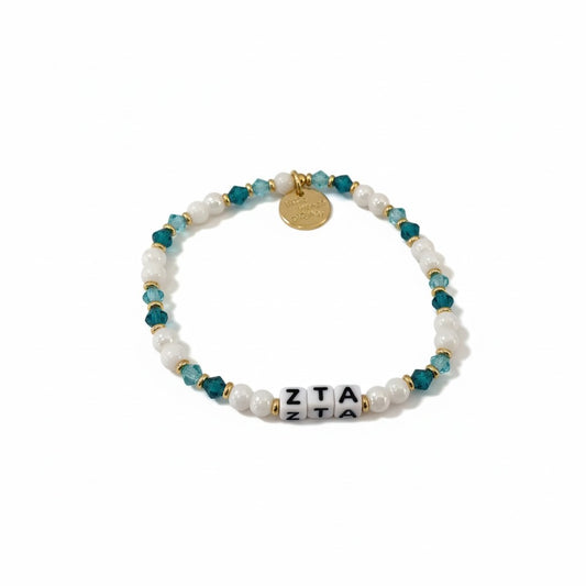 Beaded bracelet with letter beads on a white background