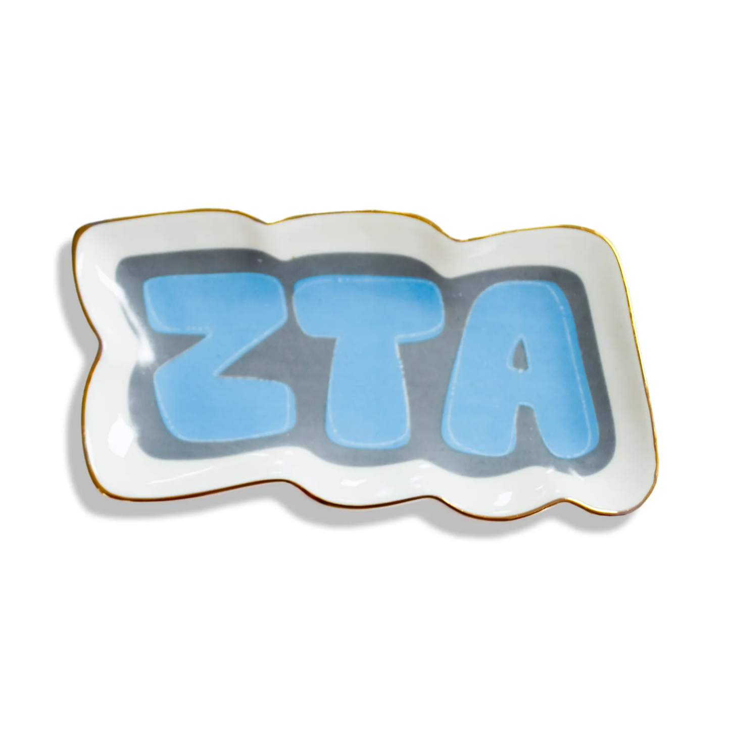 Decorative plate with 'ZTA' letters on a white background