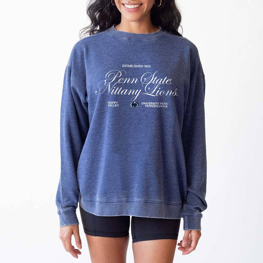 Woman wearing a blue Penn State Nittany Lions sweatshirt on a white background