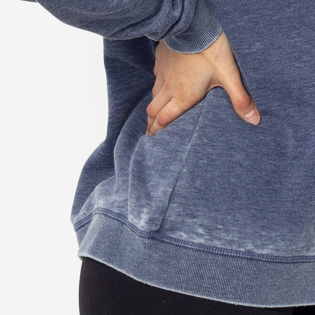 Person wearing a blue hoodie with a pocket, on a white background