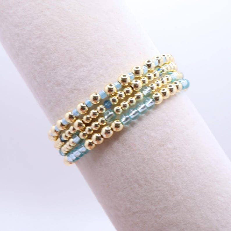 Sky Blue and Gold Hematite Bracelet Stack – The Classic Stack - Caribbean Aqua
