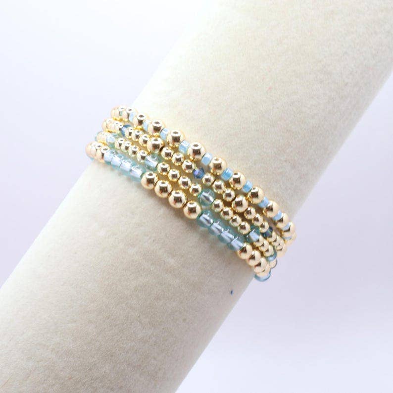 Sky Blue and Gold Hematite Bracelet Stack – The Classic Stack - Caribbean Aqua