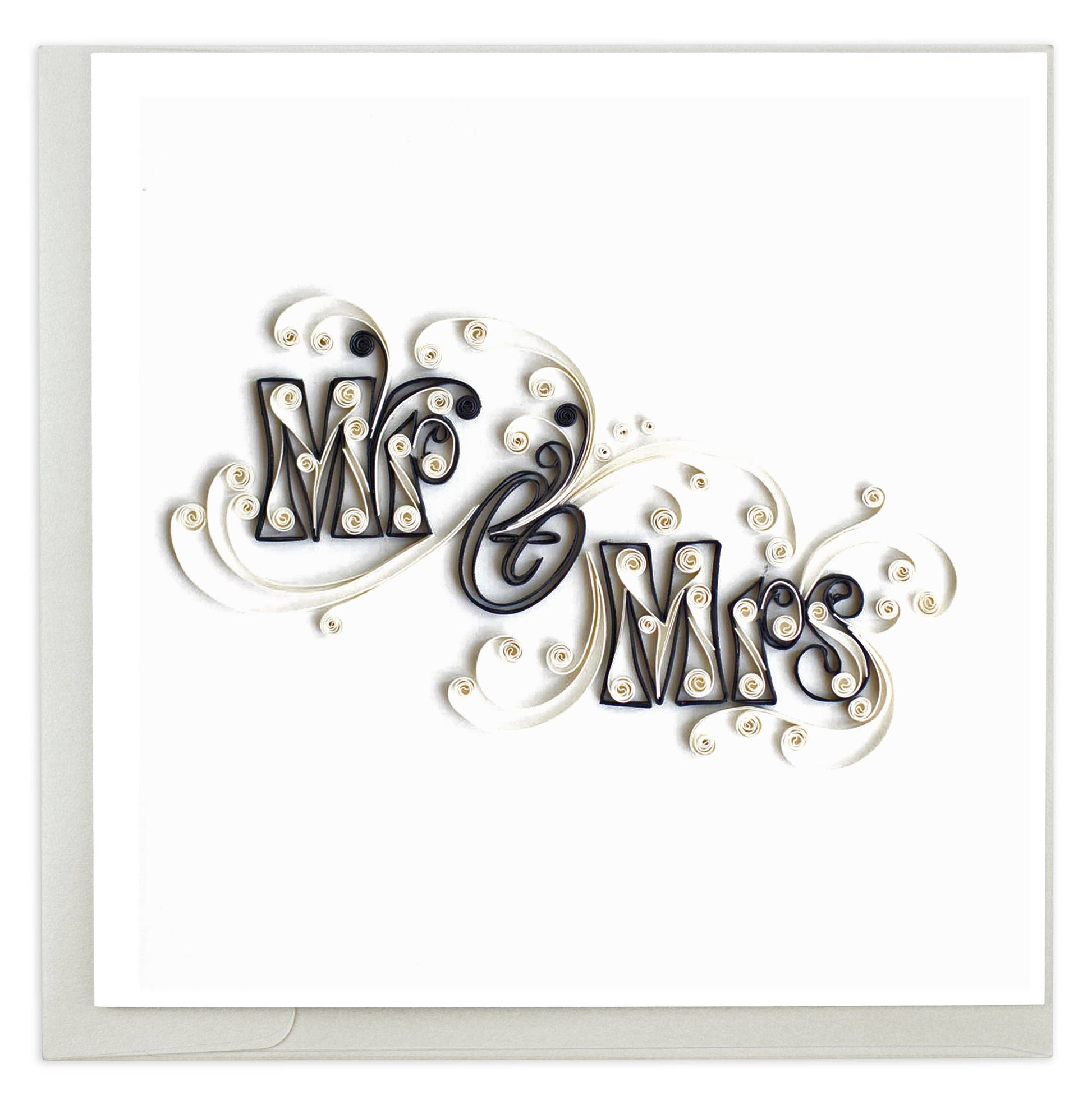 Decorative paper craft with 'Mr & Mrs' text on a white background