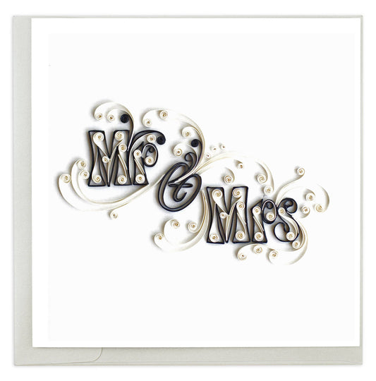 Decorative paper craft with 'Mr & Mrs' text on a white background