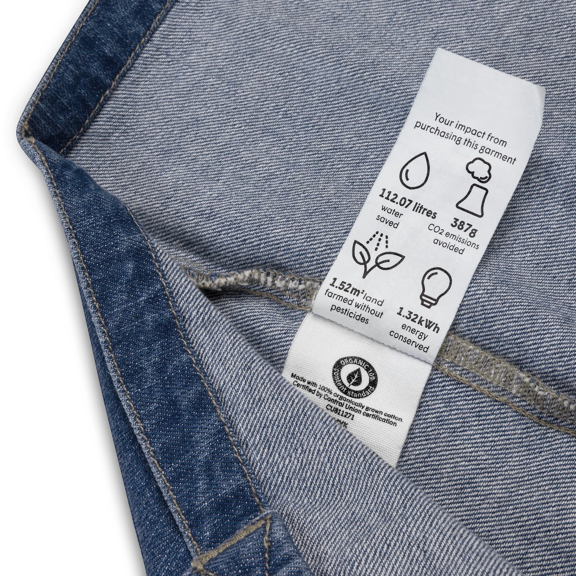 Town Pride State College organic cotton denim tote interior label showing environmental impact statistics