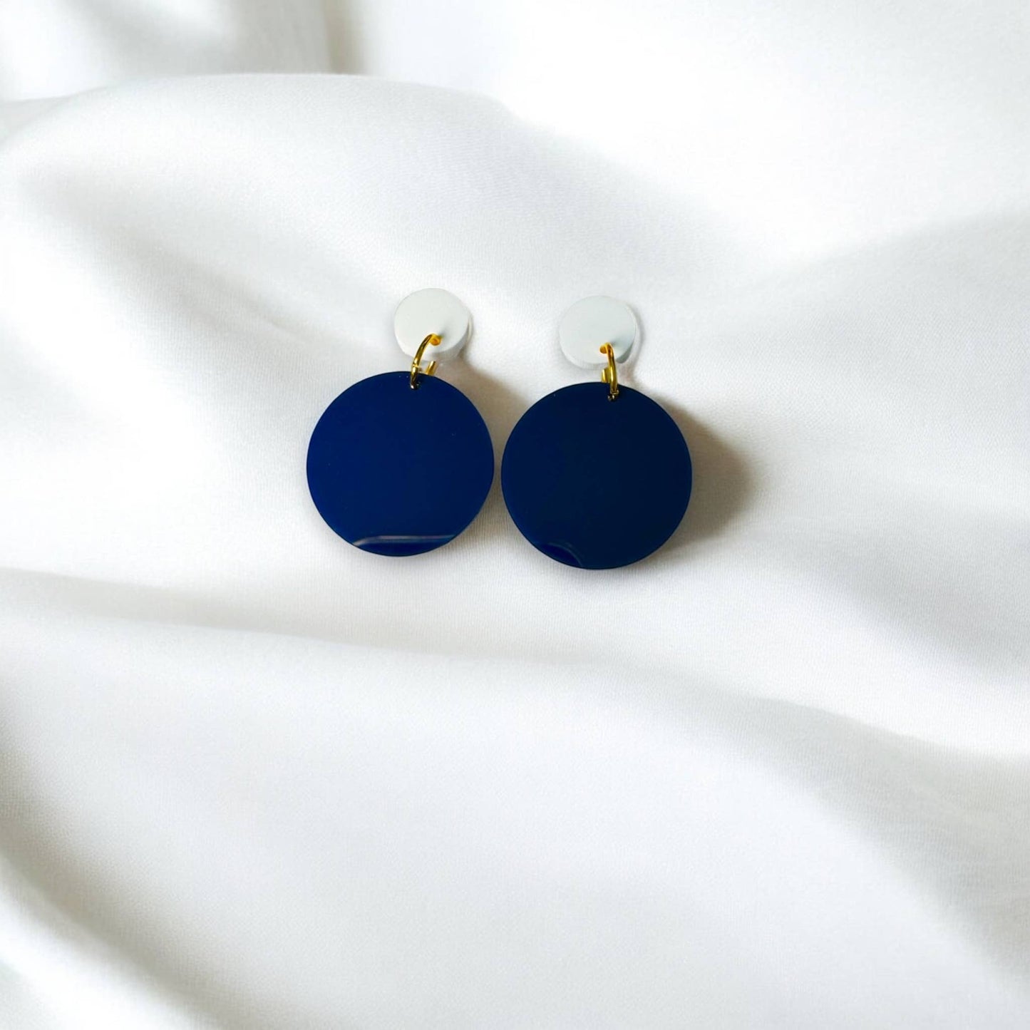 Town Pride State College navy blue acrylic circle earrings with white accents and stainless steel posts.