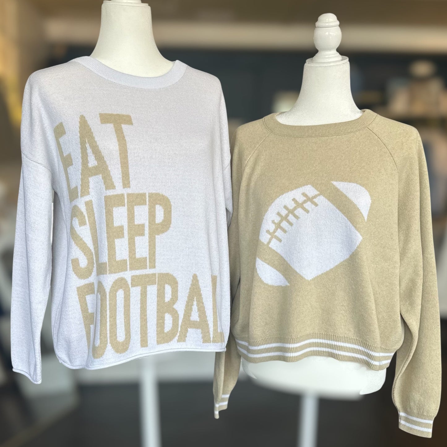 Two sweaters on mannequins with 'EAT SLEEP FOOTBALL' and football design.
